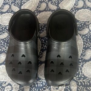 Mickey Mouse crocs.